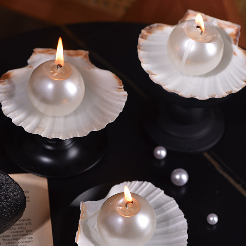 Pearl shaped Candle on Shell