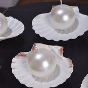 Pearl shaped Candle on Shell