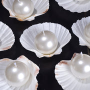 Pearl shaped Candle on Shell